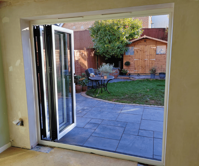 bifold doors open to patio